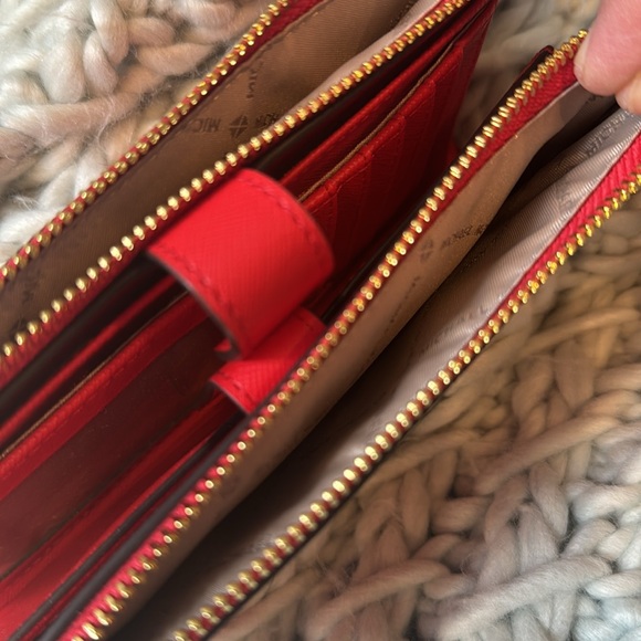 Micheal Kors red wristlet bright red perfect condition